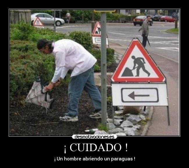 ¡ CUIDADO ! - ¡ Un hombre abriendo un paraguas !
