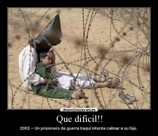 Que dificil!! - 2003 – Un prisionero de guerra Iraquí intenta calmar a su hijo.
