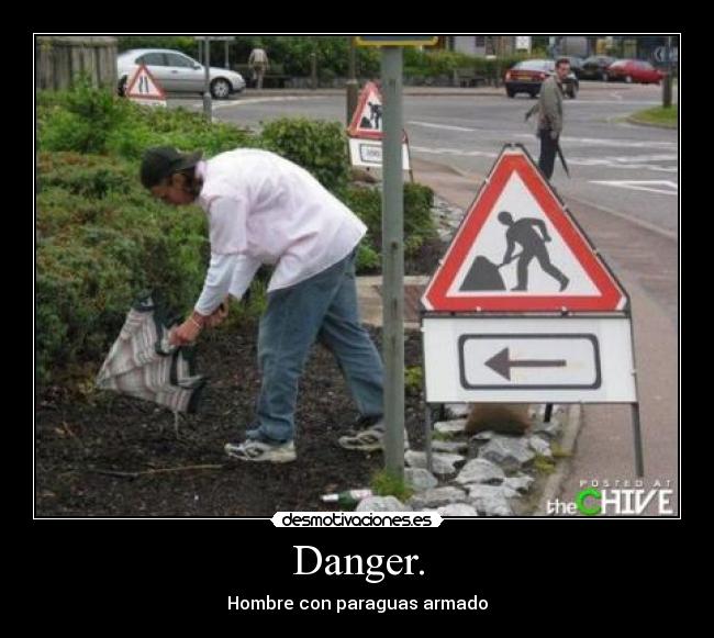 Danger. - Hombre con paraguas armado