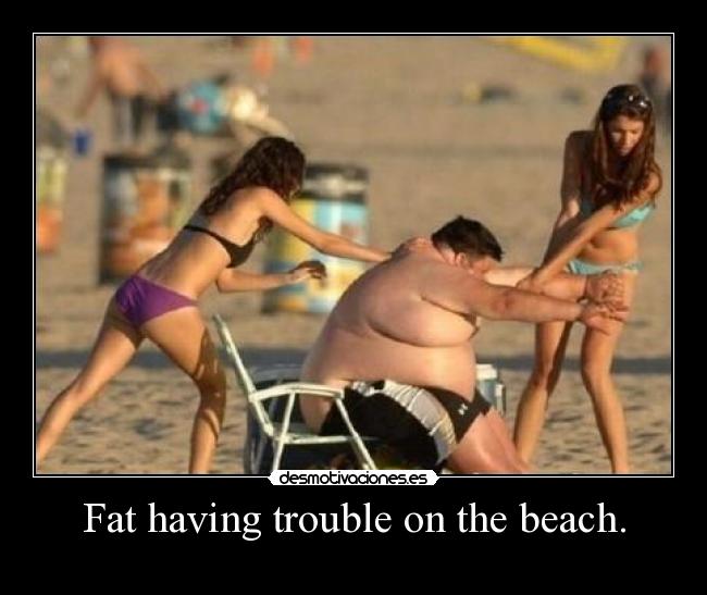 Fat having trouble on the beach. -