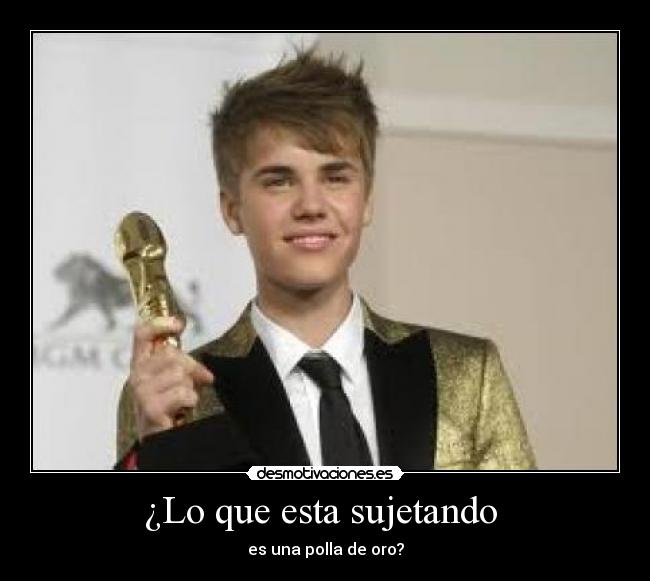 ¿Lo que esta sujetando  - es una polla de oro?