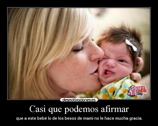 Casi que podemos afirmar - que a este bebé lo de los besos de mami no le hace mucha gracia.
