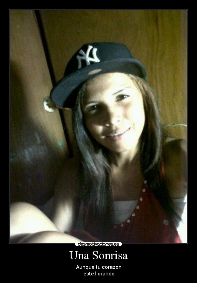 Una Sonrisa - Aunque tu corazon
este llorando