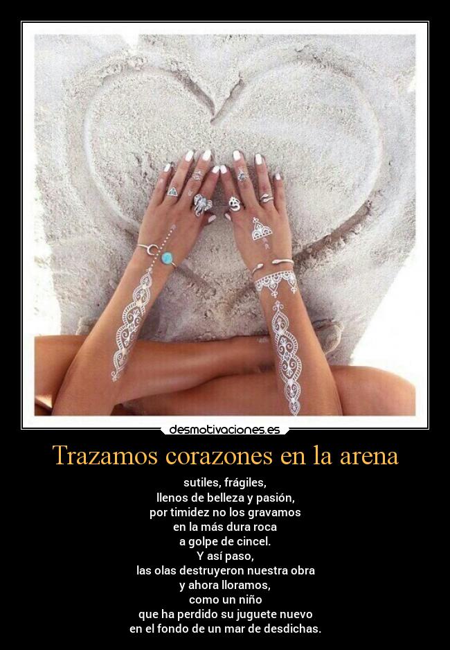 Trazamos corazones en la arena -
