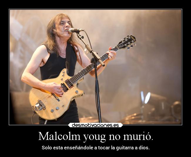 Malcolm youg no murió. - Solo esta enseñándole a tocar la guitarra a dios.